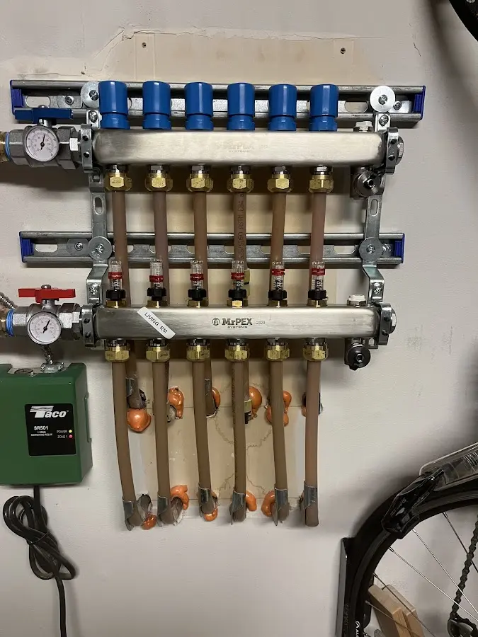 Plumber performing Water Heater Repair at a residential property in Clearlake Riviera